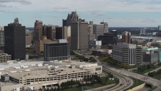 DX0002_190_009 - 5.7K aerial stock footage fly away from federal building and hotel, Downtown Detroit, Michigan