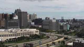 DX0002_190_014 - 5.7K aerial stock footage an orbit of the downtown police headquarters, Downtown Detroit, Michigan
