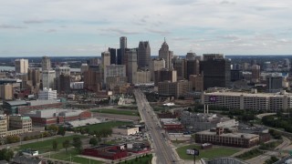 DX0002_190_019 - 5.7K aerial stock footage of flying by the towering skyscrapers in the city's skyline, Downtown Detroit, Michigan