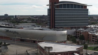 DX0002_190_026 - 5.7K aerial stock footage a close orbit of the MotorCity Casino Hotel in Detroit, Michigan