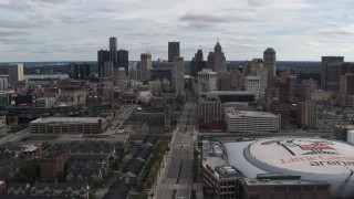 DX0002_191_003 - 5.7K aerial stock footage flying by the city's downtown skyline and arena, Downtown Detroit, Michigan