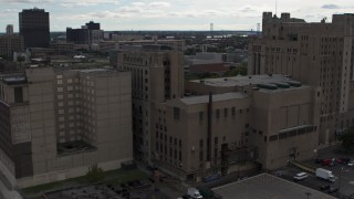 DX0002_191_005 - 5.7K aerial stock footage of orbiting the side of the Detroit Masonic Temple building, Detroit, Michigan