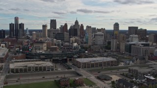 DX0002_191_011 - 5.7K aerial stock footage the skyline behind Comerica Park stadium, Downtown Detroit, Michigan