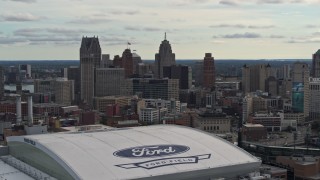 DX0002_191_023 - 5.7K aerial stock footage of the downtown skyline from Ford Field and Comerica Park, Downtown Detroit, Michigan