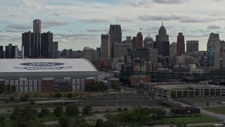 DX0002_191_031 - 5.7K aerial stock footage stationary view of skyline behind the stadiums, Downtown Detroit, Michigan