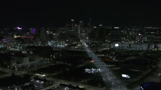 DX0002_193_022 - 5.7K aerial stock footage a wide view of the city's skyline at night, Downtown Detroit, Michigan
