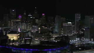 DX0002_193_054 - 5.7K aerial stock footage fly past skyline at night, reveal Comerica Park, Downtown Detroit, Michigan
