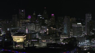 DX0002_193_057 - 5.7K aerial stock footage the downtown skyline seen from baseball stadium at night, Downtown Detroit, Michigan
