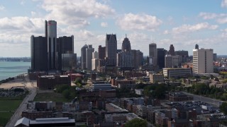 DX0002_194_008 - 5.7K aerial stock footage of passing GM Renaissance Center and the city's skyline, Downtown Detroit, Michigan