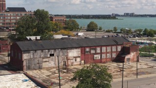 DX0002_194_018 - 5.7K aerial stock footage orbit the abandoned factory building in Detroit, Michigan