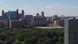 DX0002_194_033 - 5.7K aerial stock footage flyby hotel and casino, jail and courthouse, reveal apartment buildings, Downtown Detroit, Michigan
