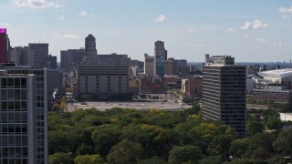 DX0002_194_034 - 5.7K aerial stock footage flyby courthouse, reveal apartment buildings, Downtown Detroit, Michigan