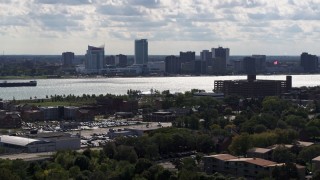 DX0002_194_040 - 5.7K aerial stock footage of a wide view of the skyline of Windsor, Ontario, Canada seen from Detroit side of the river