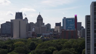DX0002_194_044 - 5.7K aerial stock footage of office tower, churches and the hotel and casino, Downtown Detroit, Michigan