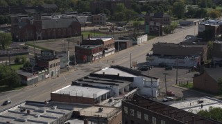 DX0002_195_040 - 5.7K aerial stock footage orbit a street intersection in Detroit, Michigan
