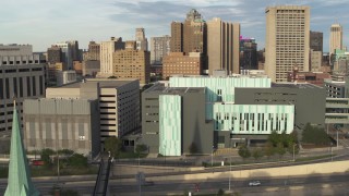 DX0002_196_043 - 5.7K aerial stock footage of circling the Detroit Public Safety Headquarters in Downtown Detroit, Michigan