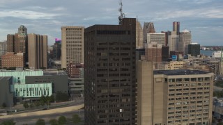 DX0002_196_047 - 5.7K aerial stock footage of orbiting the Executive Plaza Building in Downtown Detroit, Michigan