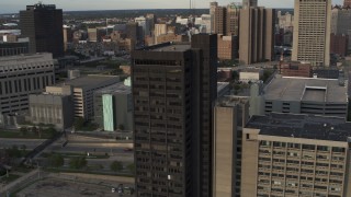 DX0002_196_050 - 5.7K aerial stock footage of orbiting around the Executive Plaza Building in Downtown Detroit, Michigan