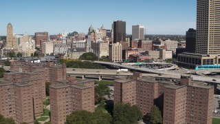 DX0002_200_005 - 5.7K aerial stock footage descend past I-190, city skyline, and apartment buildings, Downtown Buffalo, New York