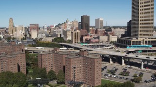 DX0002_200_007 - 5.7K aerial stock footage flyby apartment buildings and skyline, reveal I-190, Downtown Buffalo, New York