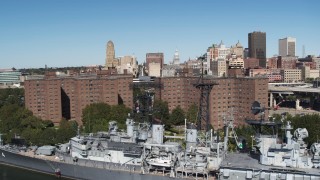 DX0002_200_014 - 5.7K aerial stock footage of the skyline while descending past apartment buildings, Downtown Buffalo, New York