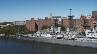 DX0002_200_018 - 5.7K aerial stock footage orbit the USS Little Rock in Downtown Buffalo, New York