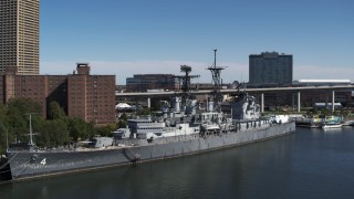 DX0002_200_019 - 5.7K aerial stock footage orbit and approach the USS Little Rock in Downtown Buffalo, New York