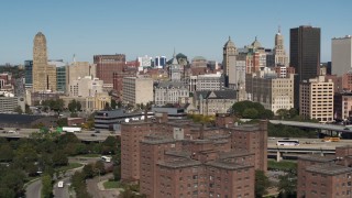DX0002_201_002 - 5.7K aerial stock footage of flying by County and City Hall in the city's skyline, Downtown Buffalo, New York