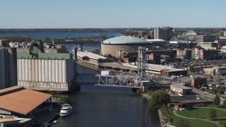 DX0002_201_015 - 5.7K aerial stock footage KeyBank Center arena by the river, Downtown Buffalo, New York