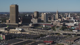 DX0002_201_043 - 5.7K aerial stock footage slowly flying by the baseball stadium and skyline in Downtown Buffalo, New York