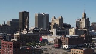 DX0002_202_001 - 5.7K aerial stock footage of One M&T Plaza while flying near Erie Community College, Downtown Buffalo, New York