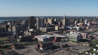 DX0002_202_015 - 5.7K aerial stock footage reverse view of community college and office towers in Downtown Buffalo, New York