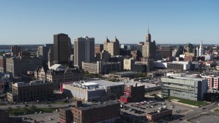 DX0002_202_018 - 5.7K aerial stock footage reverse view of office towers near the community college in Downtown Buffalo, New York