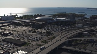 DX0002_202_022 - 5.7K aerial stock footage of orbiting KeyBank Center arena and freeway, Downtown Buffalo, New York