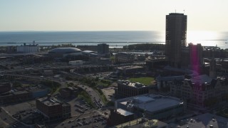 DX0002_203_009 - 5.7K aerial stock footage arena and baseball stadium by skyscraper in Downtown Buffalo, New York