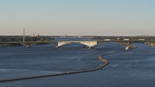 DX0002_203_026 - 5.7K aerial stock footage of flying by the Peace Bridge in Buffalo, New York