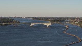 DX0002_203_027 - 5.7K aerial stock footage of ascending by the Peace Bridge in Buffalo, New York