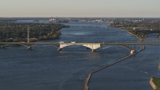 DX0002_203_028 - 5.7K aerial stock footage of traffic crossing the Peace Bridge in Buffalo, New York