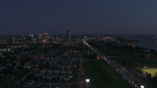 DX0002_204_050 - 5.7K aerial stock footage flyby I-190 leading to skyline at twilight, Downtown Buffalo, New York