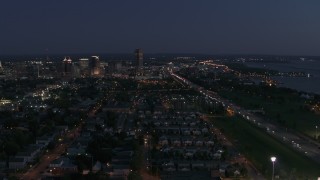 DX0002_204_054 - 5.7K aerial stock footage wide view of Seneca One Tower and skyline at twilight, Downtown Buffalo, New York