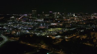 DX0002_205_004 - 5.7K aerial stock footage of the city skyline at night during descent, Downtown Buffalo, New York