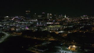 DX0002_205_005 - 5.7K aerial stock footage of passing by the city skyline at night, Downtown Buffalo, New York