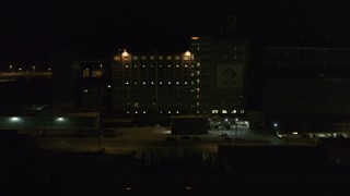 DX0002_205_022 - 5.7K aerial stock footage of circling a flour mill at night, Buffalo, New York