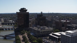 DX0002_206_018 - 5.7K aerial stock footage orbit riverfront office towers and hotel, Downtown Rochester, New York