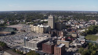 DX0002_206_022 - 5.7K aerial stock footage flying toward Kodak Tower and Monroe Community College, Rochester, New York