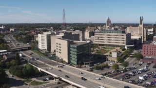 DX0002_207_013 - 5.7K aerial stock footage of approaching the police station in Downtown Rochester, New York