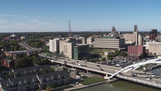DX0002_207_016 - 5.7K aerial stock footage orbit of the police station by I-490, Downtown Rochester, New York