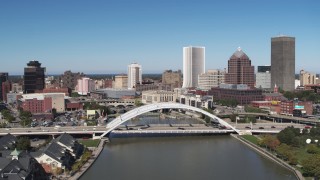 DX0002_207_026 - 5.7K aerial stock footage approach Douglass-Anthony Bridge and downtown high-rises, Downtown Rochester, New York