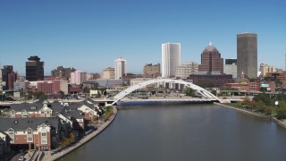 DX0002_207_031 - 5.7K aerial stock footage view of the skyline behind the Douglass-Anthony Bridge, Downtown Rochester, New York