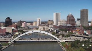 DX0002_207_032 - 5.7K aerial stock footage fly over the Douglass-Anthony Bridge and past the skyline, Downtown Rochester, New York